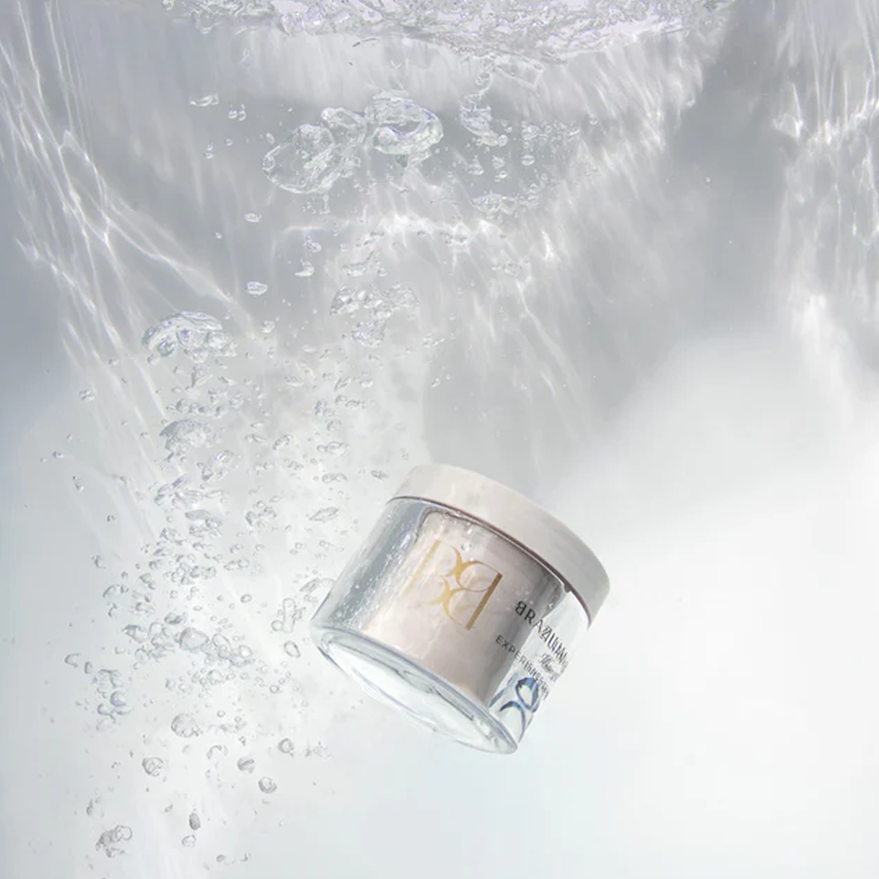 Brazilian Beauty Hair Mask jar with water droplets and bubbles on a light gray background