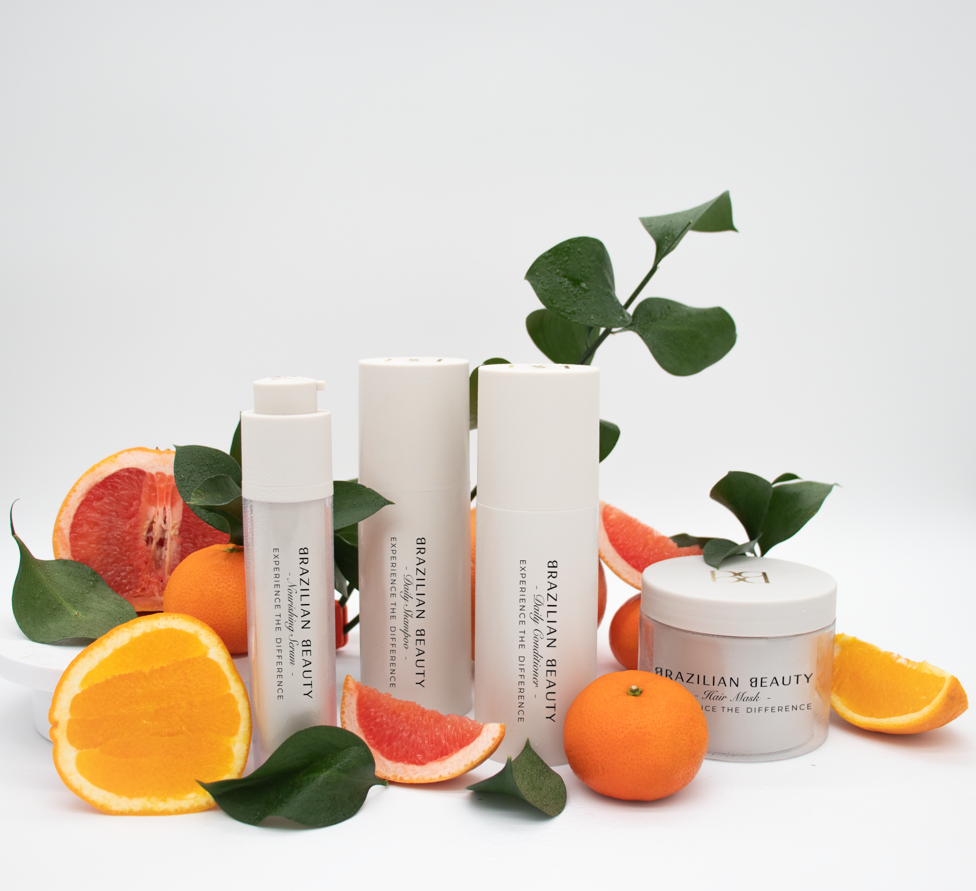 Daily Bundle products with fruit around it laying in a neutral background. 