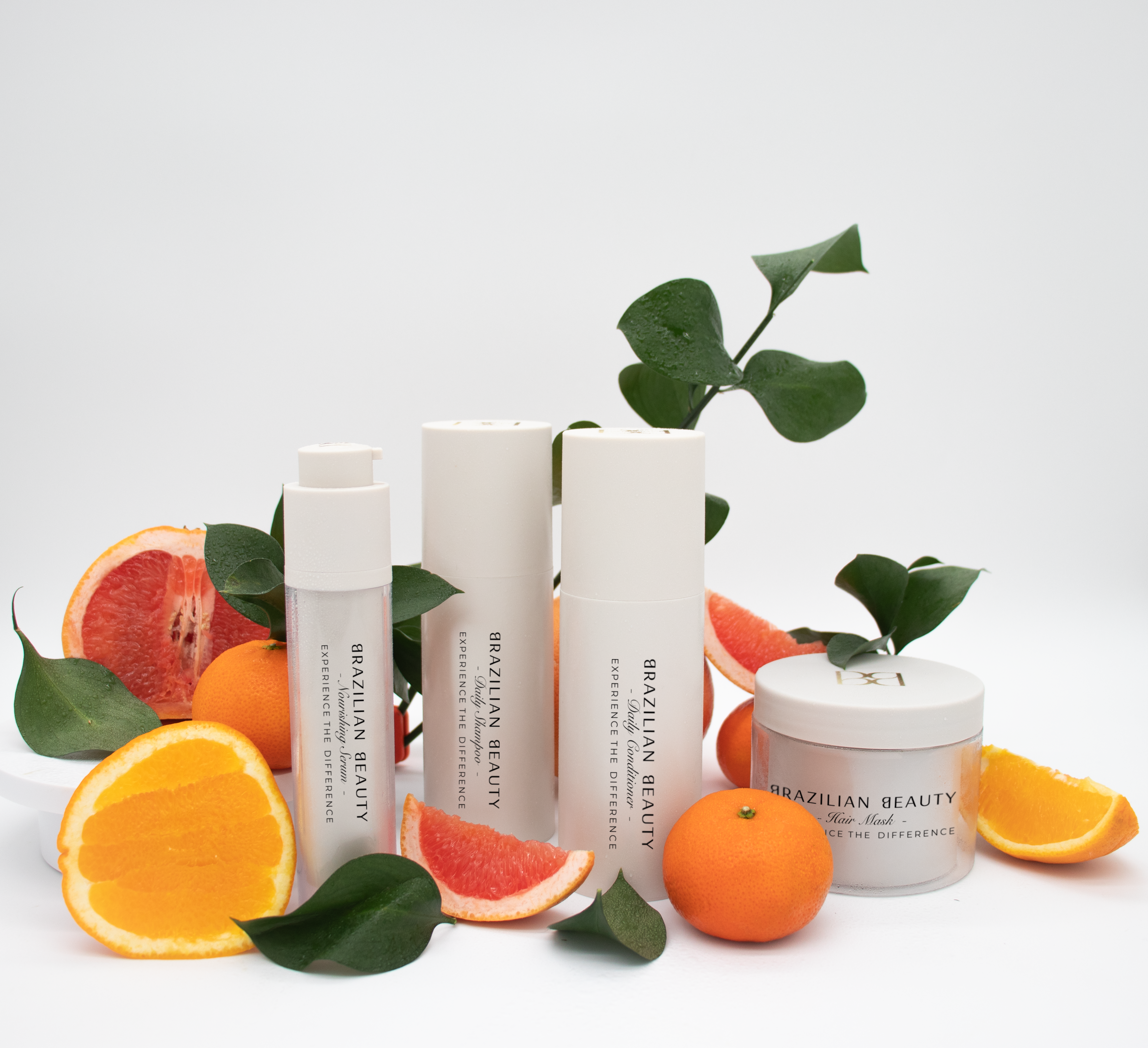 Daily Bundle products with fruit around it laying in a neutral background. 